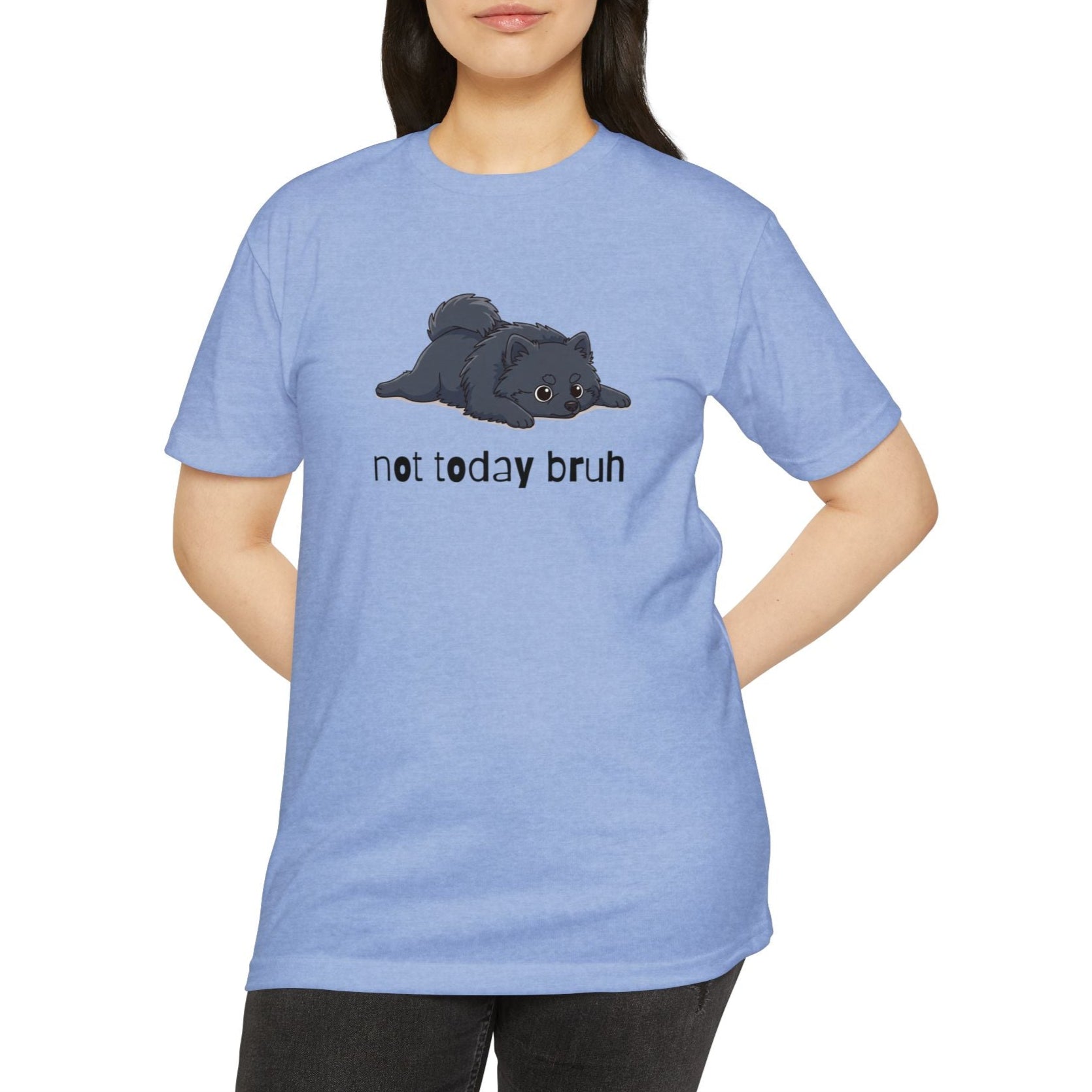 Person wearing a blue t-shirt with a graphic and text on a white background